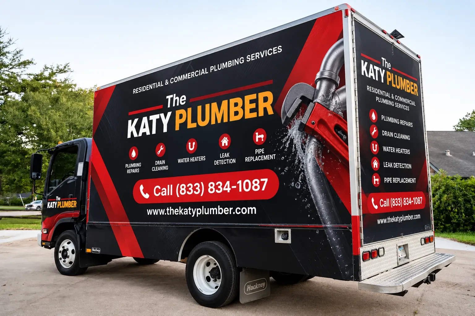 The Katy Plumber branded service truck — residential and commercial plumbing services, including plumbing repairs, drain cleaning, water heaters, leak detection and pipe replacement. Call (833) 834-1087.